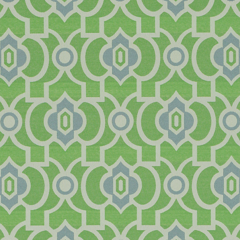 Vibrant green geometric upholstery fabric with interlocking white lines and light blue diamonds and circles in a repeating lattice.