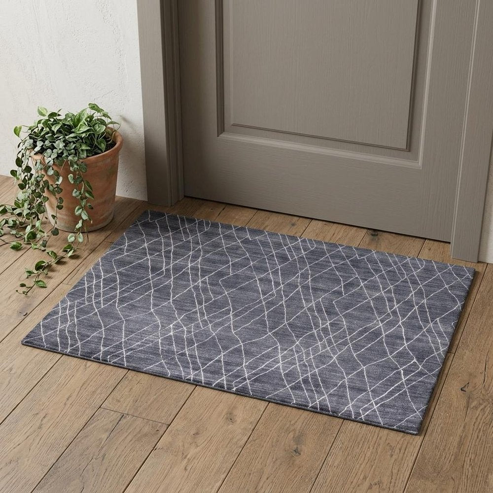 5' X 8' Blue And Ivory Abstract Hand Woven Area Rug