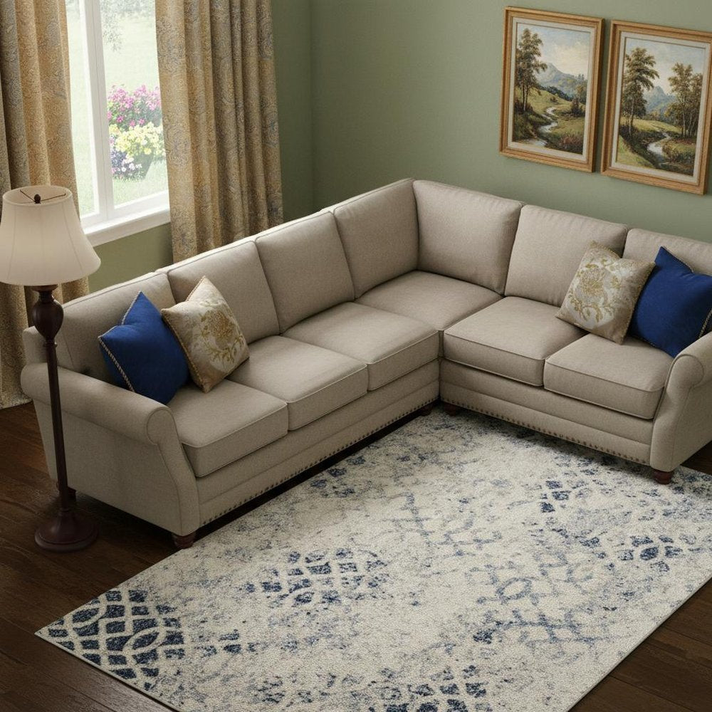 7' X 10' Ivory And Blue Abstract Power Loom Distressed Area Rug