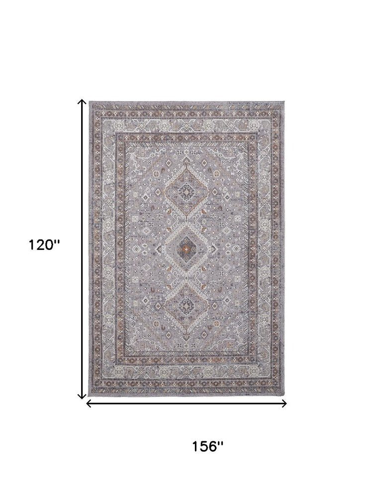 10' X 13' Gray Orange And Ivory Floral Power Loom Stain Resistant Area Rug