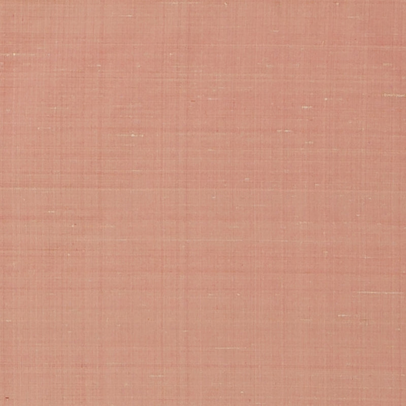 Salmon pink linen drapery fabric swatch with visible weave texture and soft matte finish