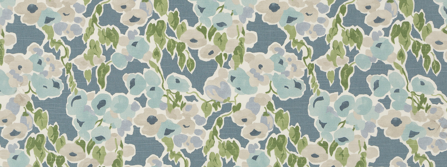 Blue floral print with pale blue and white blossoms and green leaves in a watercolor-style aquatint pattern.