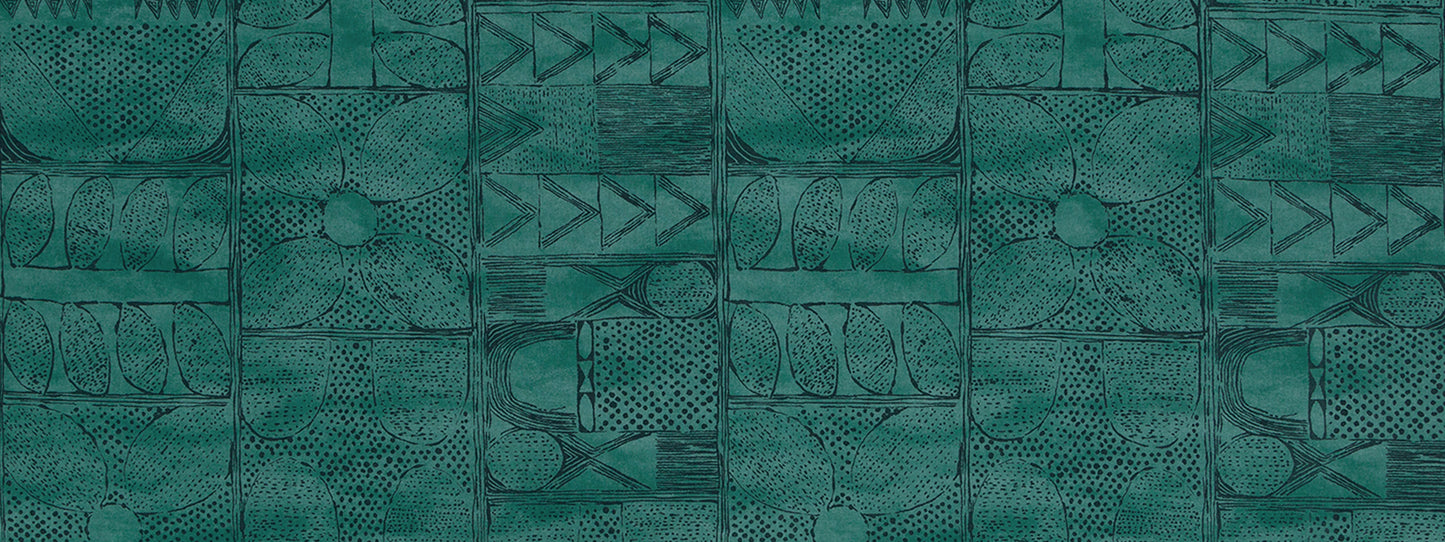 Teal patchwork fabric print swatch with geometric blocks, triangles and circles.
