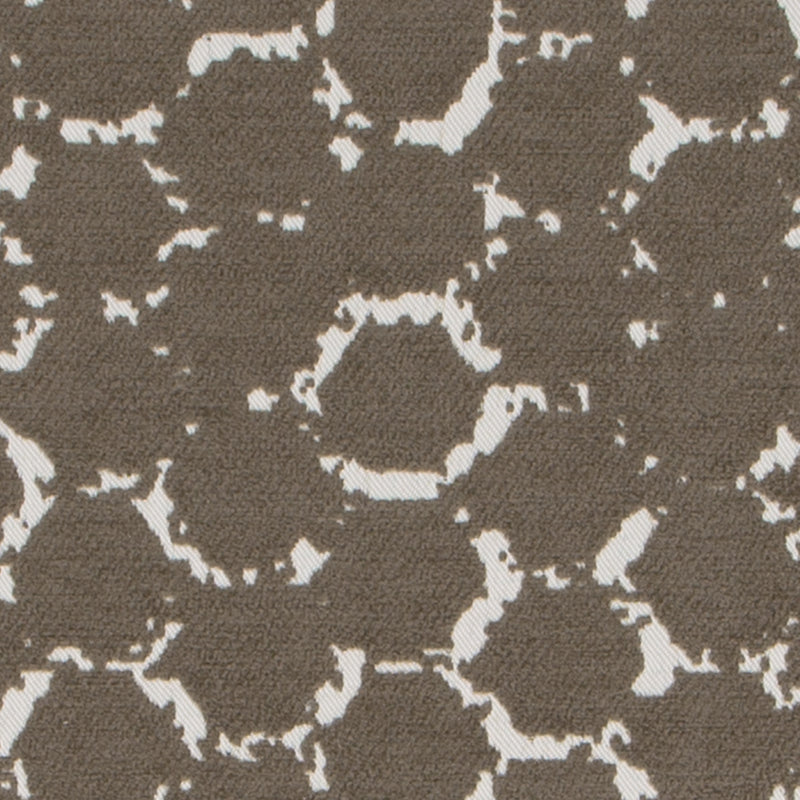 Brown boucle upholstery fabric with cream honeycomb pattern.