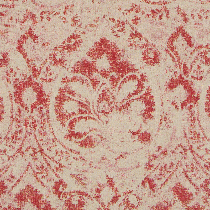 Red damask pattern on upholstery fabric; ornate scrolling floral motif.