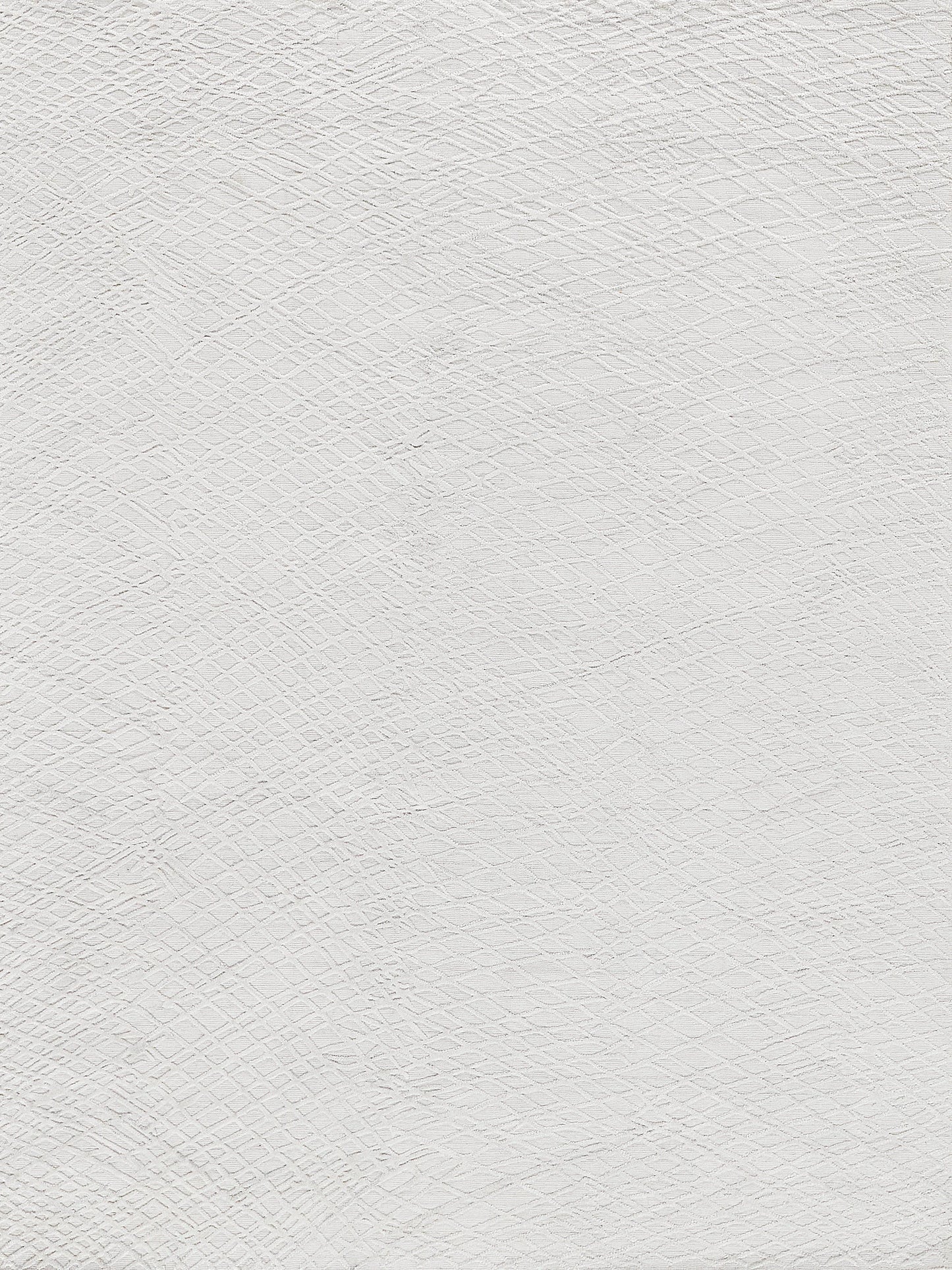 White handloomed rectangular rug with a subtle diamond pattern.