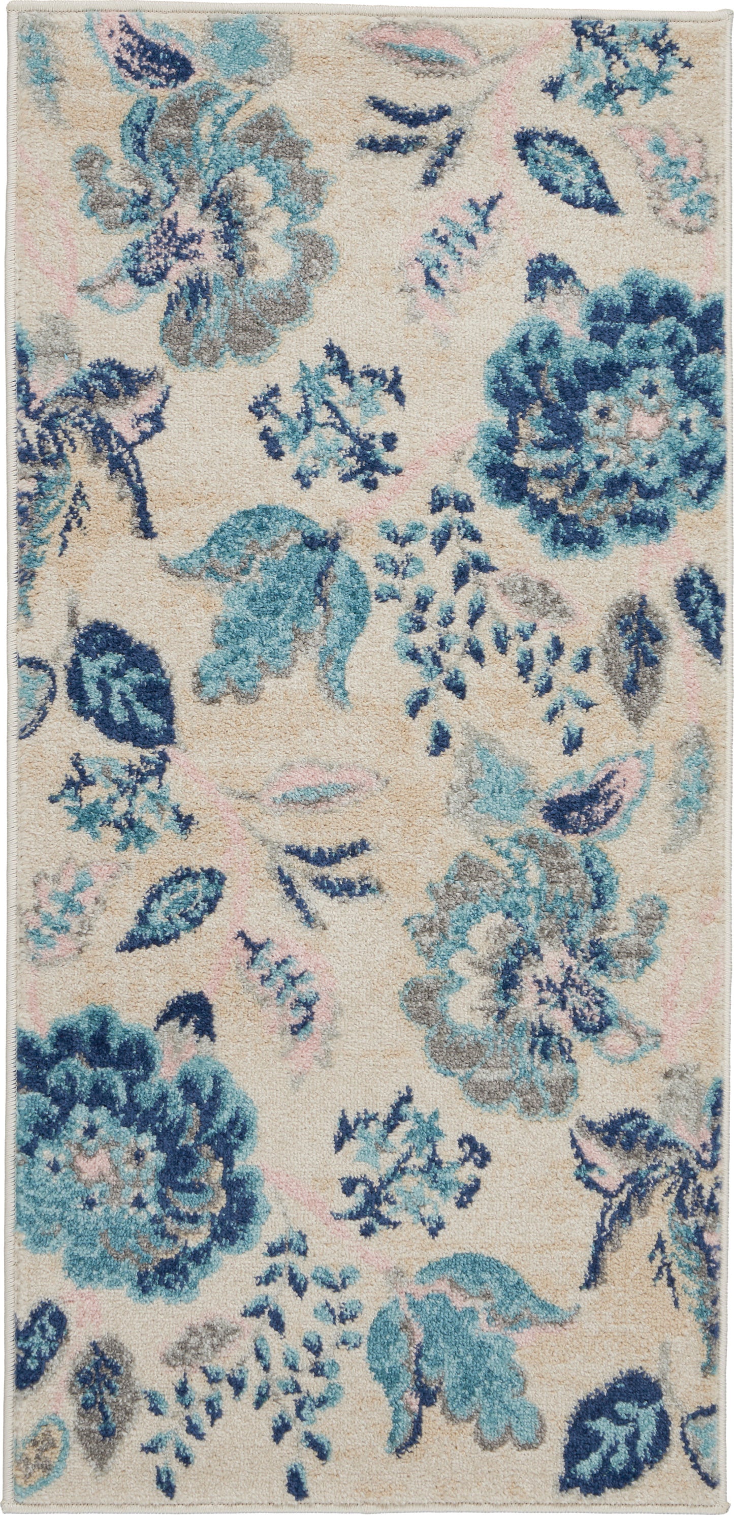Rectangular plush area rug with beige background and blue-teal floral pattern; soft tufted pile ideal for living room decor.