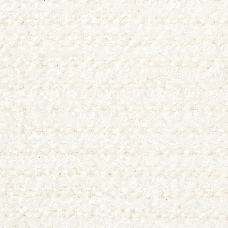 Ivory chenille fabric close-up with soft, looped texture, versatile for blankets or coats.