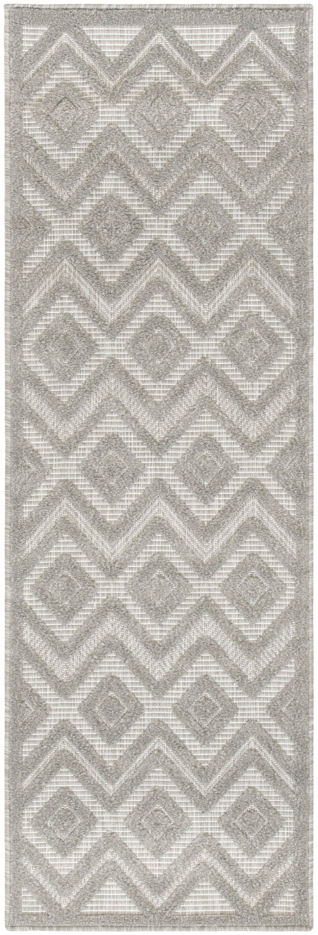 Light gray and ivory geometric runner with diamonds and chevrons, textured woven pile.