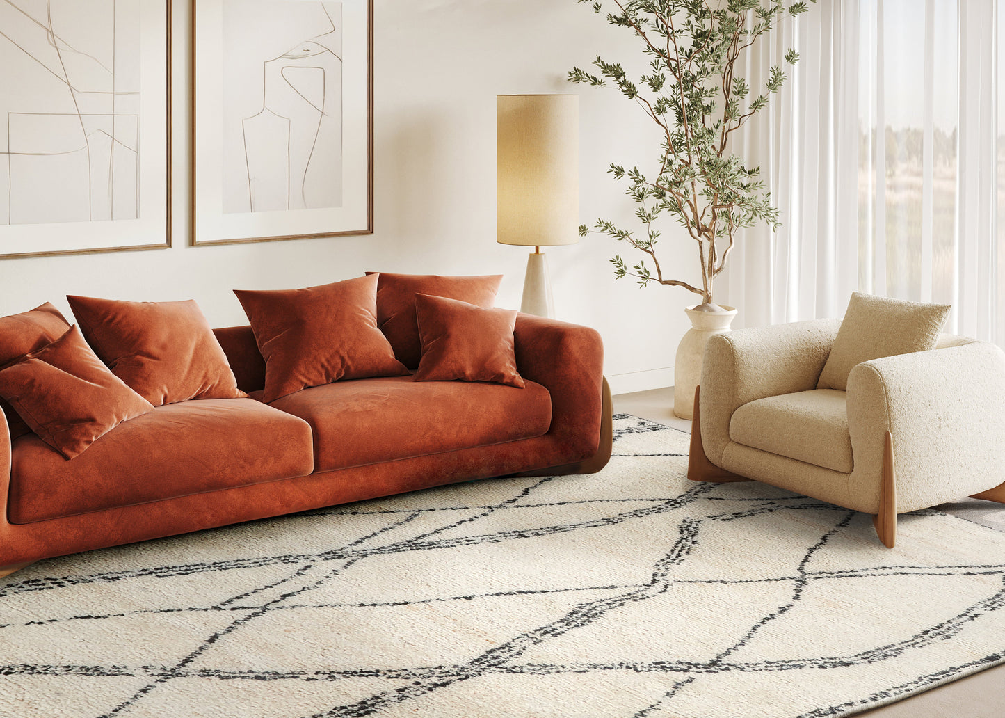 Burnt orange hand-knotted rug with a geometric pattern in a modern living room with abstract art.