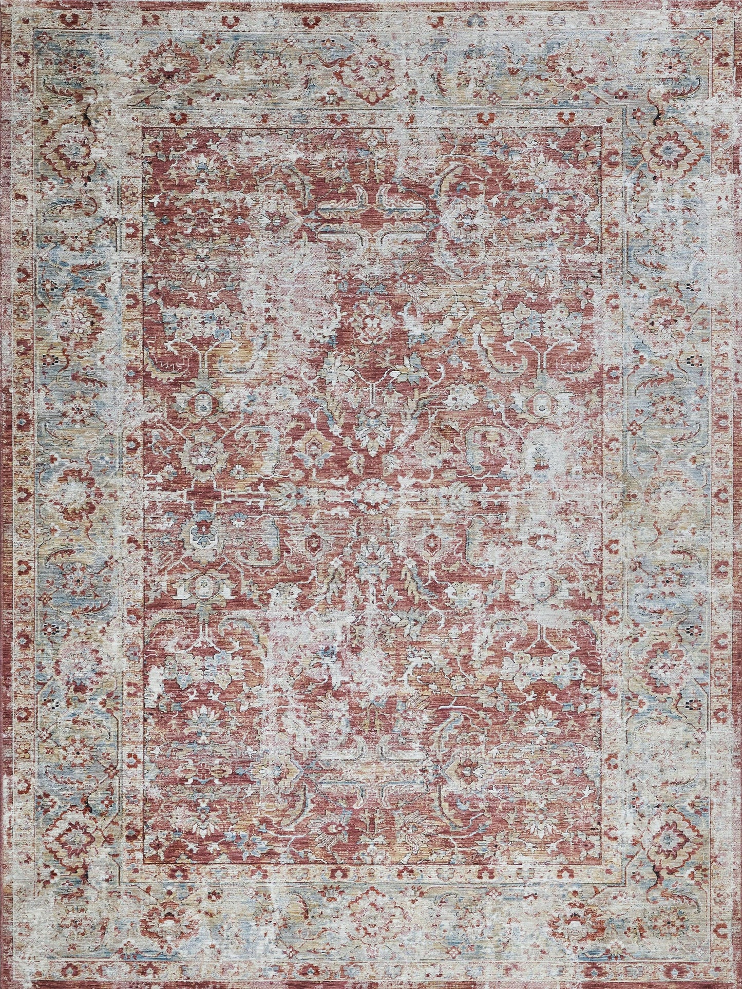 Vintage distressed oriental rug with pink center, blue-gray border, and ornate floral motifs.