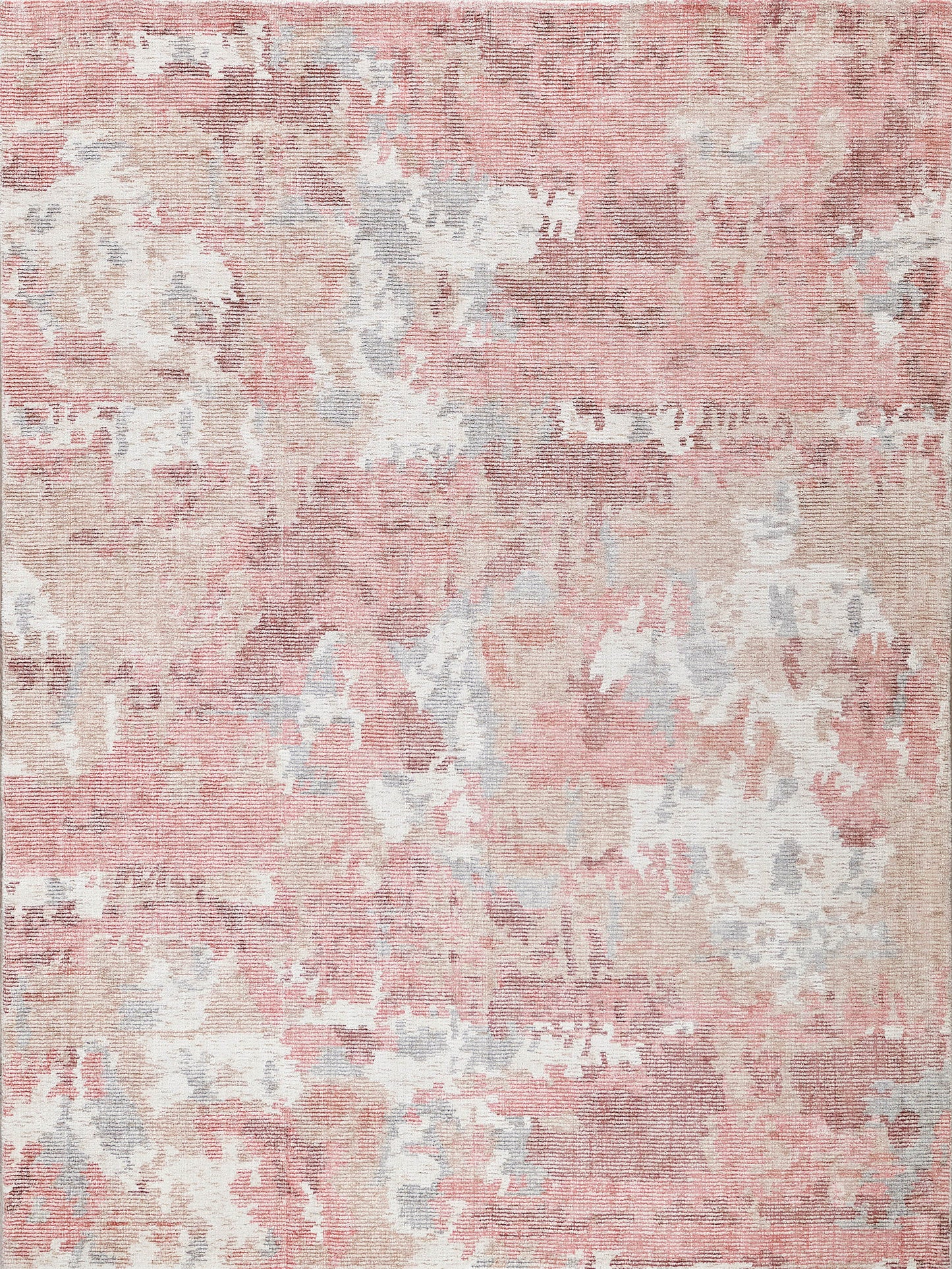 Distressed pink and peach area rug with ivory and light blue accents; soft medium-pile, ideal for living rooms.
