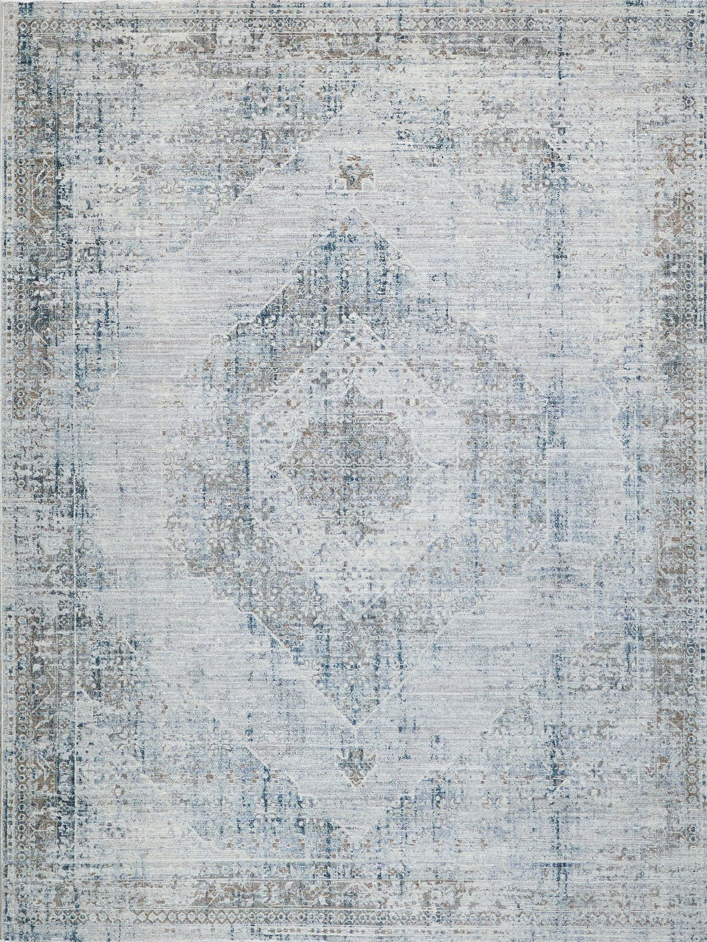 Distressed blue and ivory oriental rug with faded medallion center and decorative border.