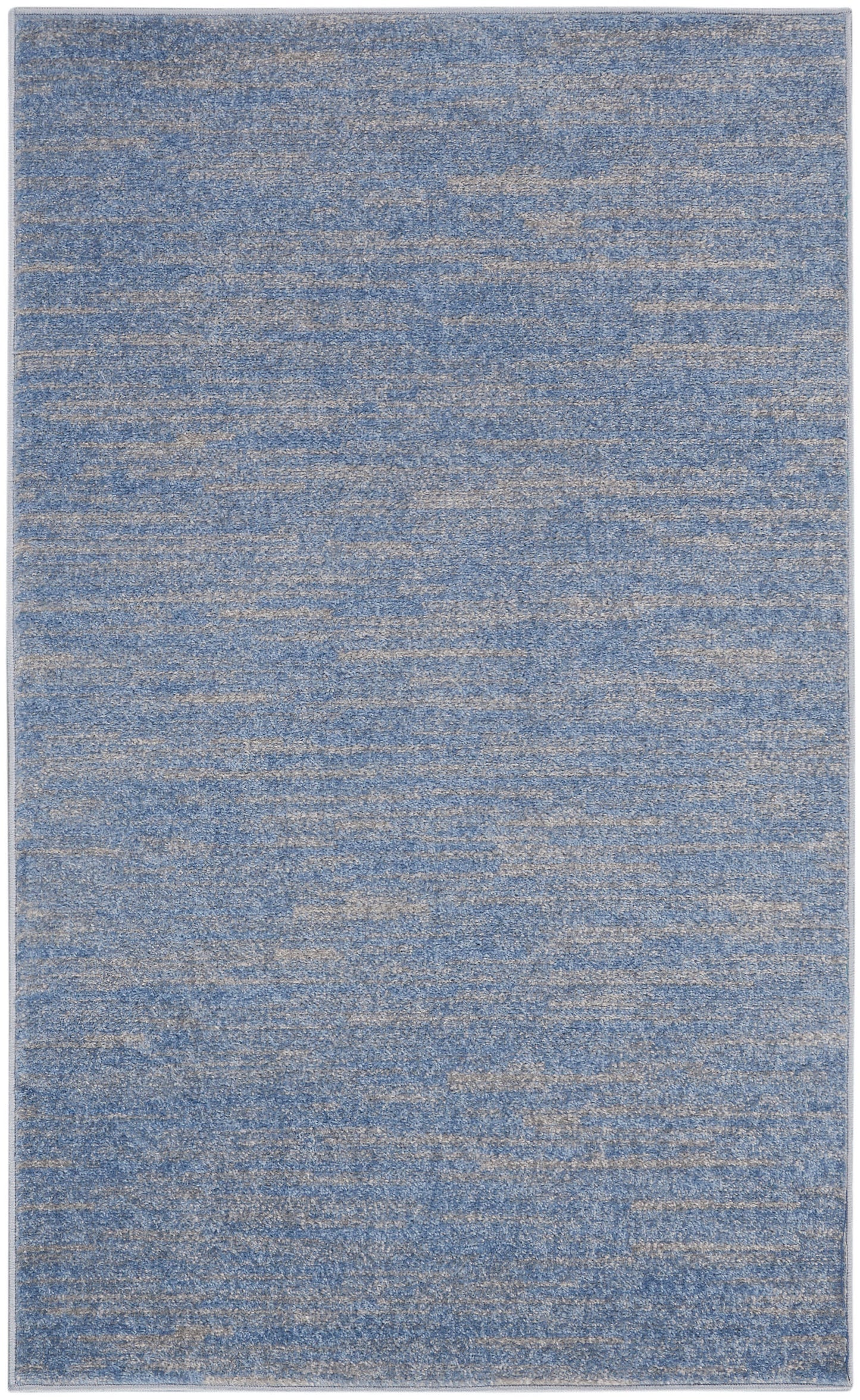 Blue and beige-speckled rectangular area rug with a soft, textured pile.