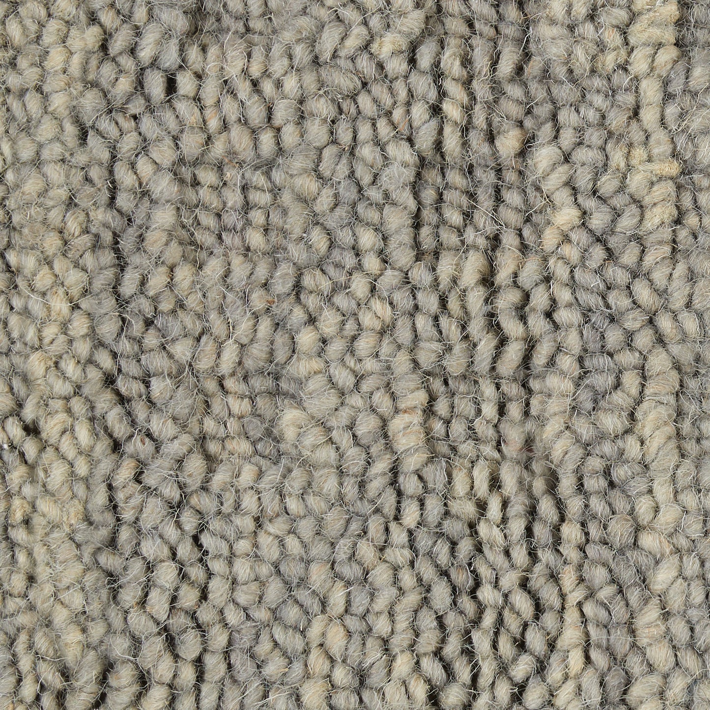 Neutral gray-beige loop-pile rug runner close-up; dense textured yarns for a soft, durable floor covering.
