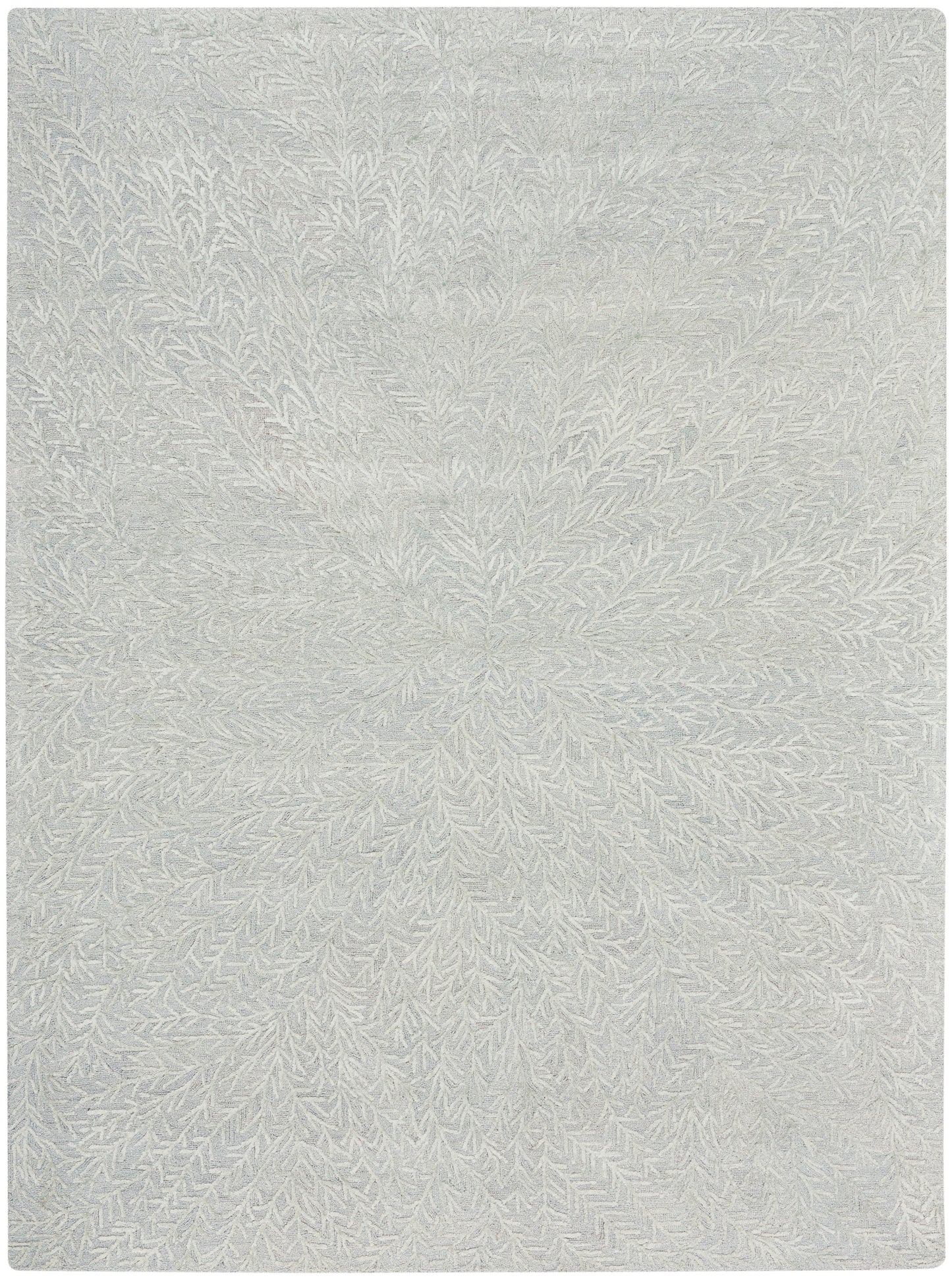 Light gray rug with radiating fern-like pattern and soft plush woven texture.