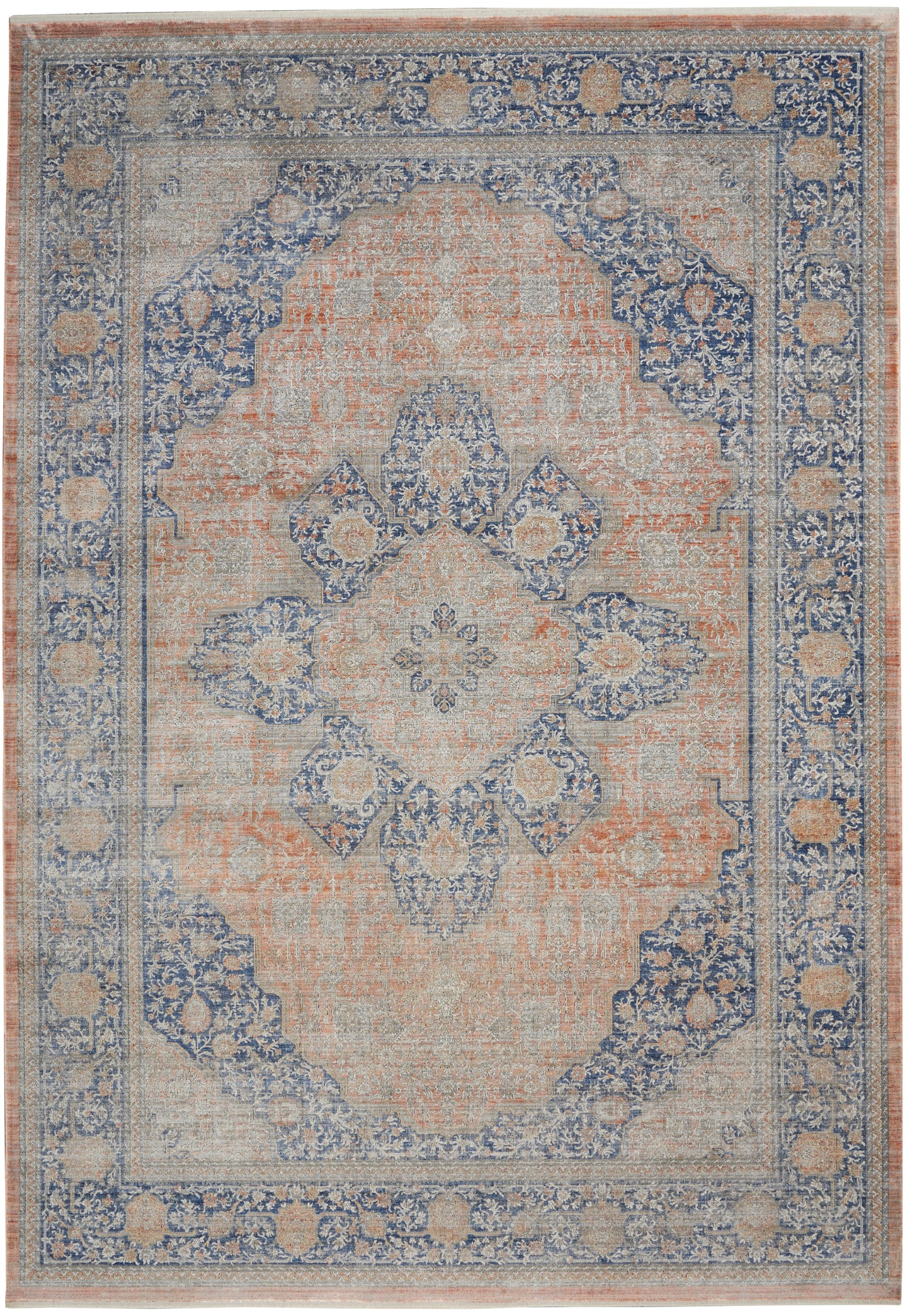 Rectangular vintage-style oriental area rug in peach and blue with a distressed central medallion and floral borders.