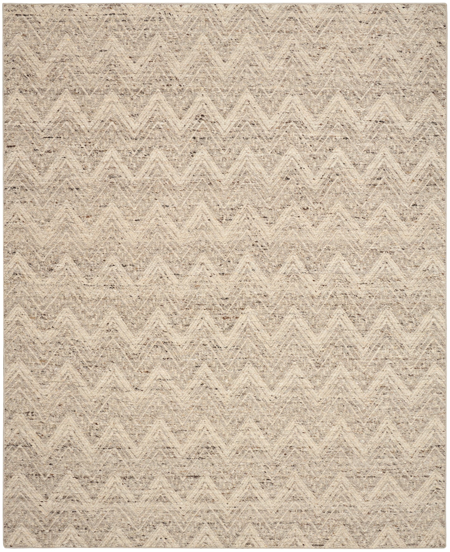 Beige textured rug with a soft chevron zigzag pattern in neutral tones.