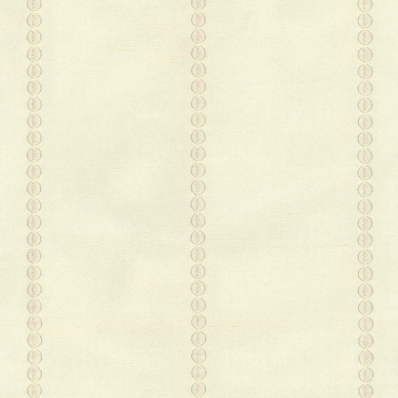 Cream wallpaper with vertical columns of small beige circular medallions; vintage decorative wallcovering.