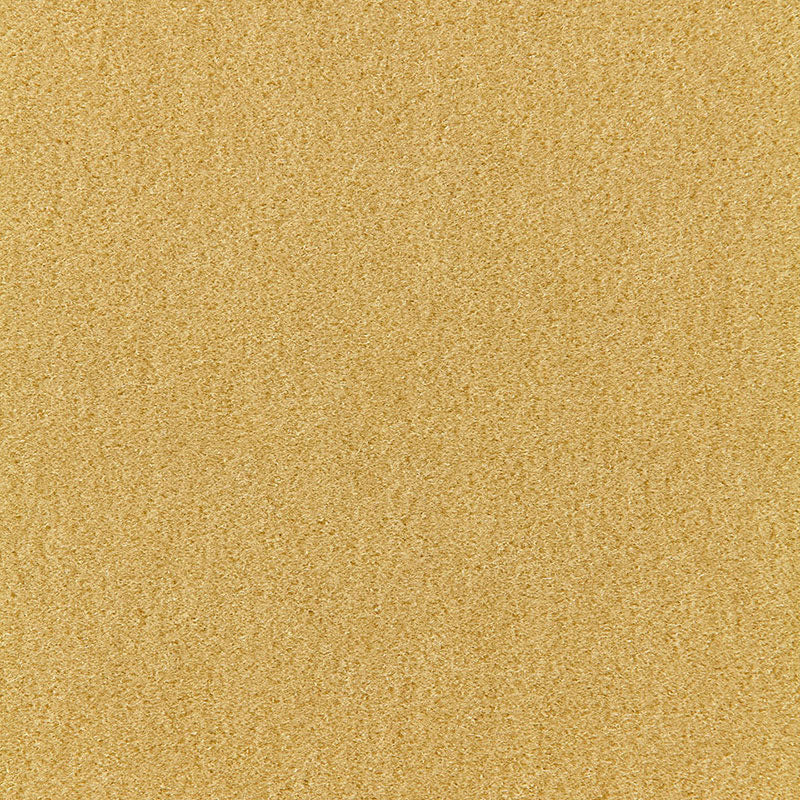 Gold-toned textured surface with fine grain, flat metallic finish resembling sand or glitter.