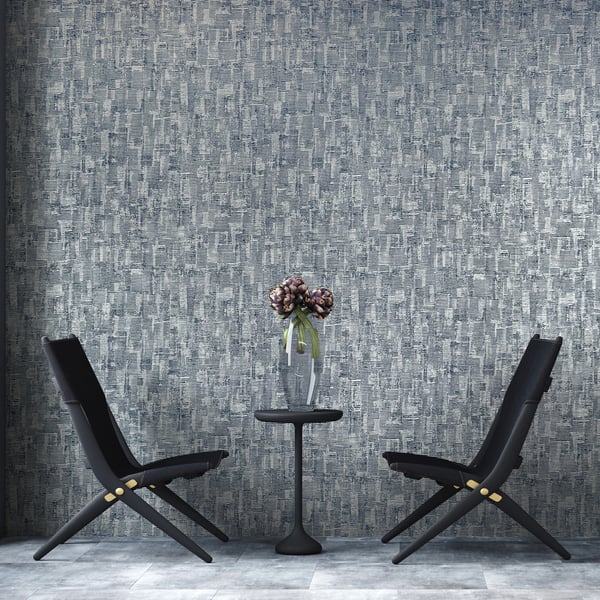 Silver grey jacquard wallcovering with a subtle textured pattern.