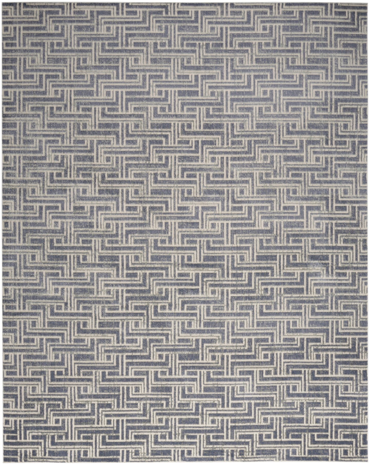 Blue and cream woven rug with a repeated interlocking meander pattern.