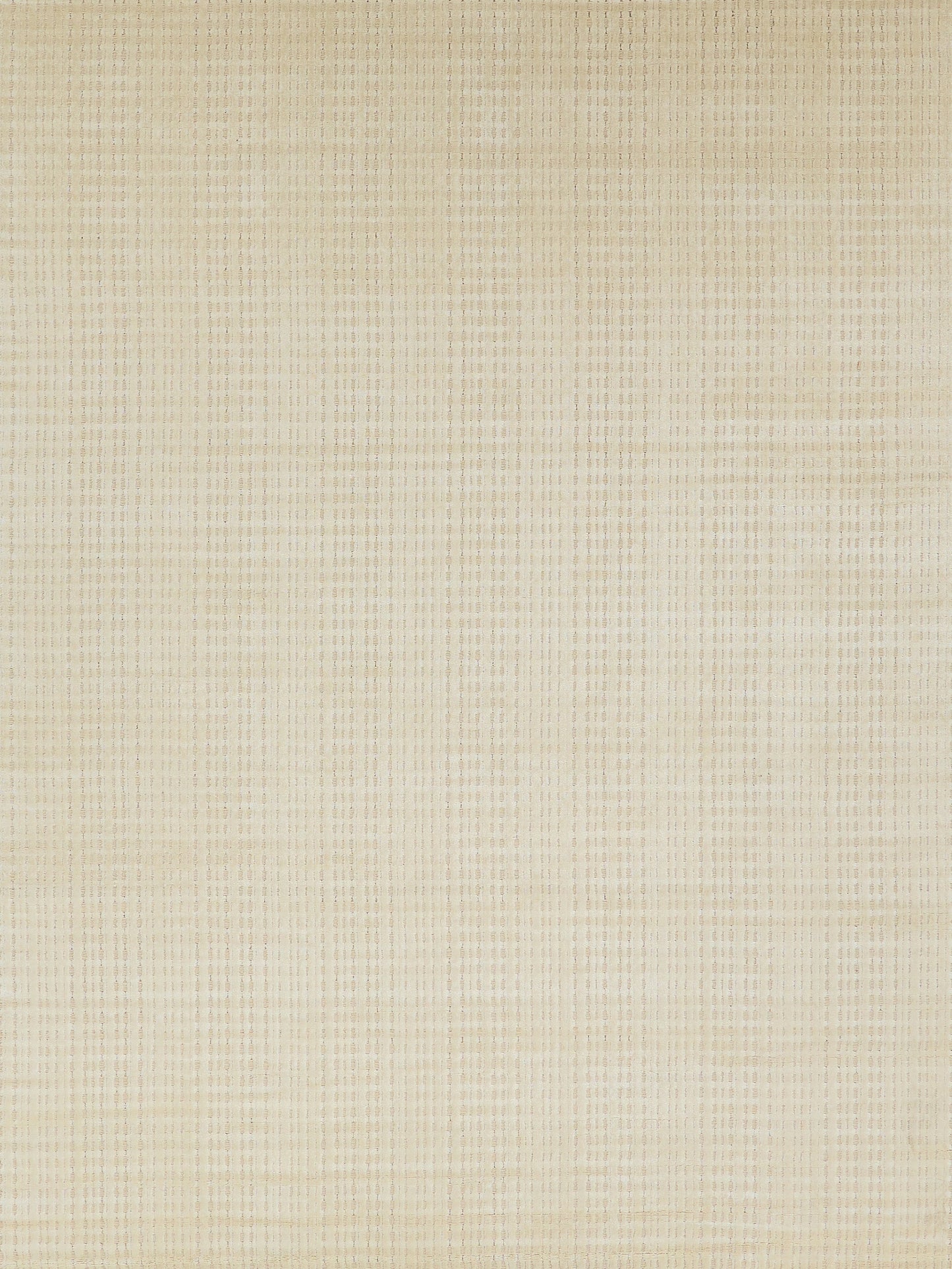 Beige woven rug with subtle vertical stripes; hand-loomed indoor rug.