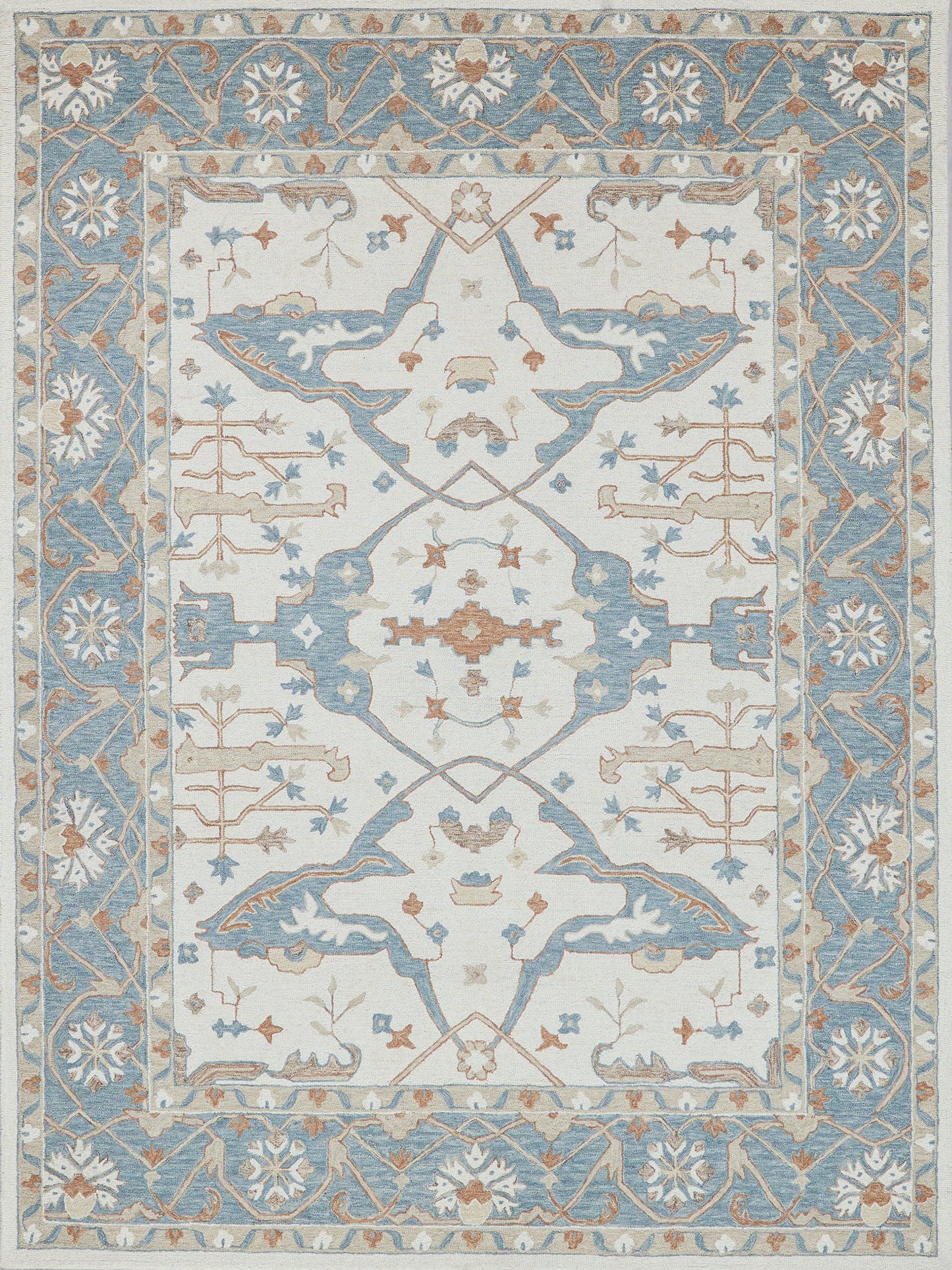Textured area rug featuring intricate floral and geometric patterns in blue, cream, and rust colors. Perfect for home decor.