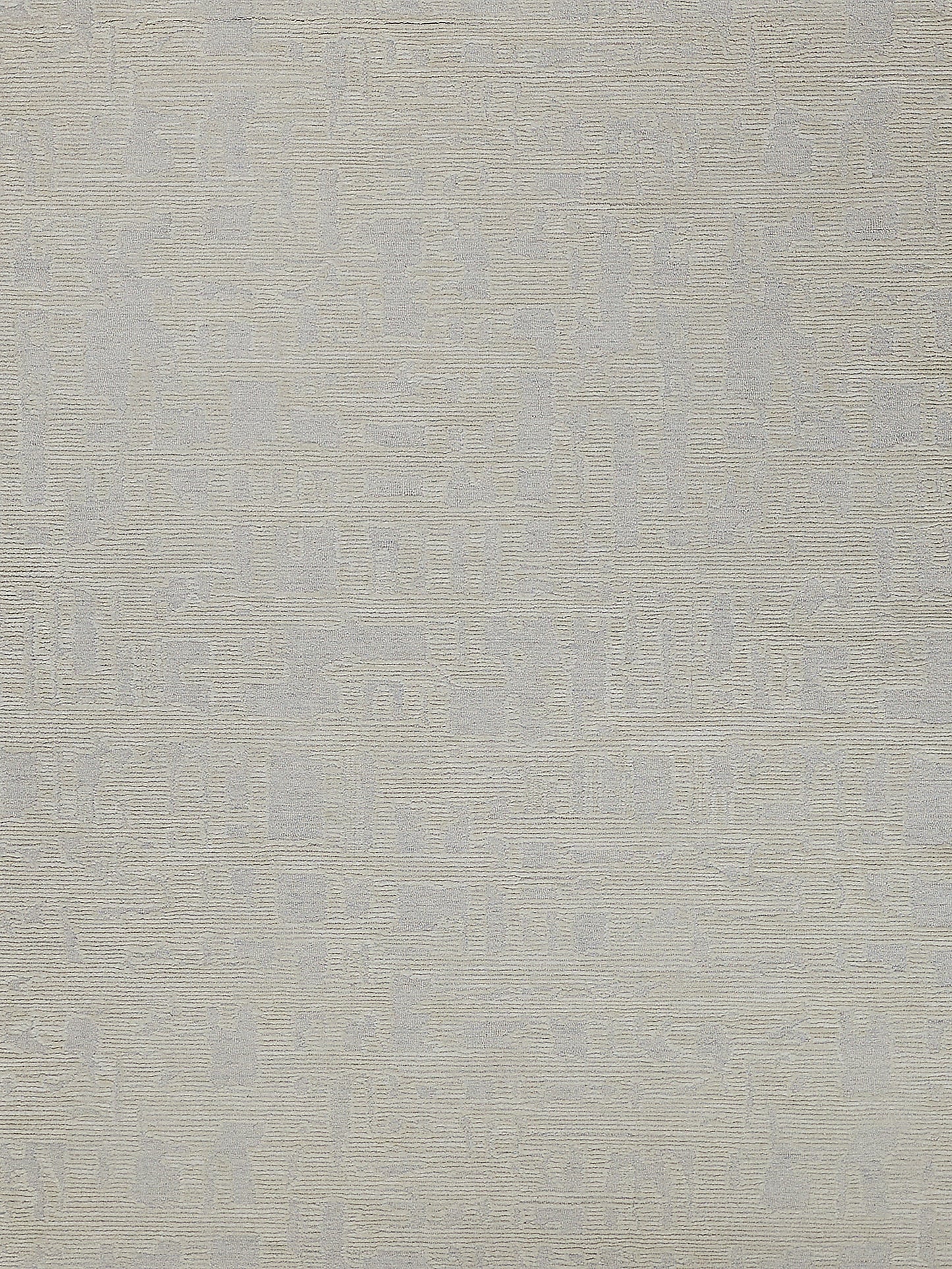 Textured light beige rug with subtle patterns and a soft, woven look; hand-tufted rectangular rug (6' x 9').