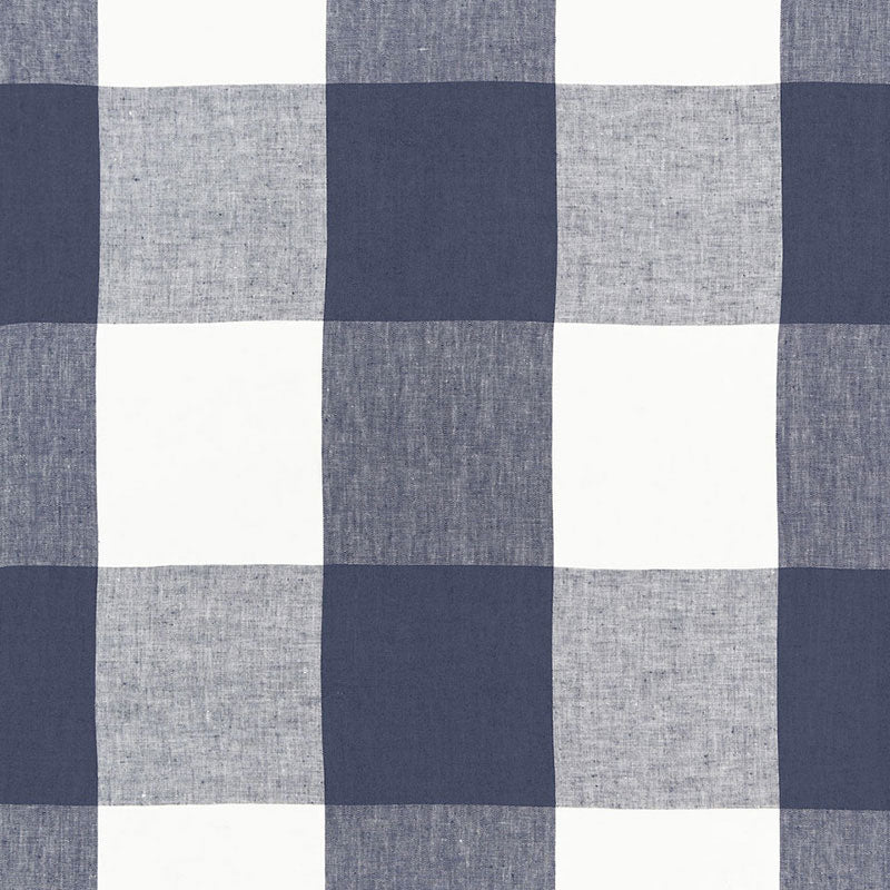 Navy blue and white checkered fabric with large squares; cotton-like textile for shirts, bedding, or table linens.