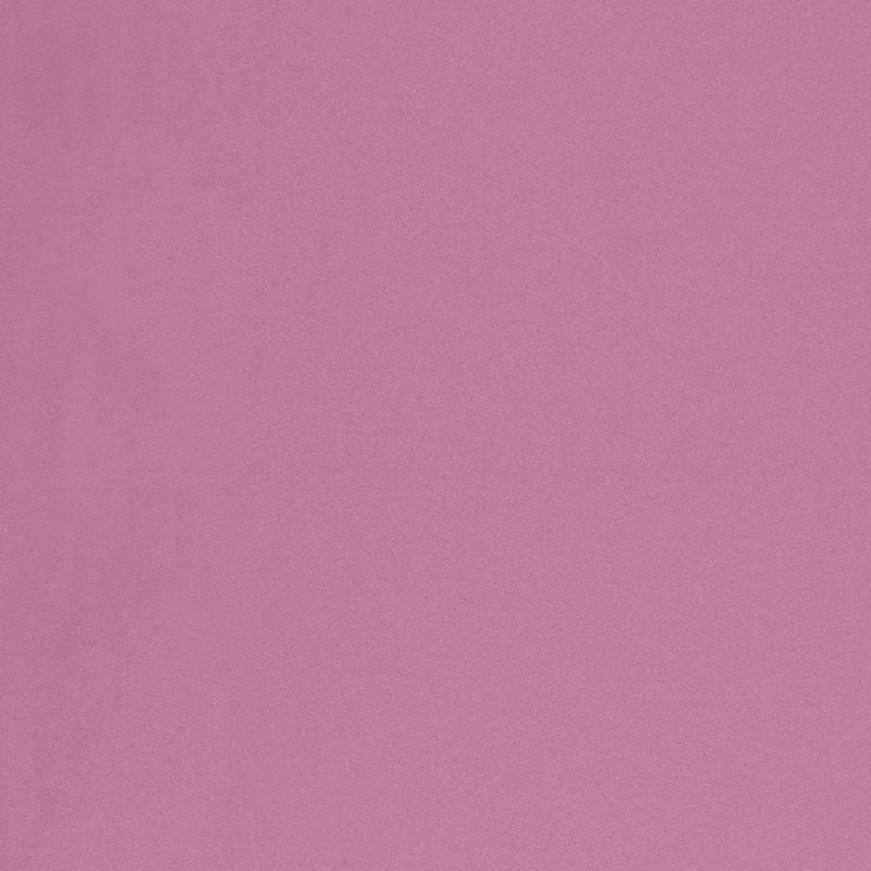 Dusty pink fabric texture background with soft matte finish.