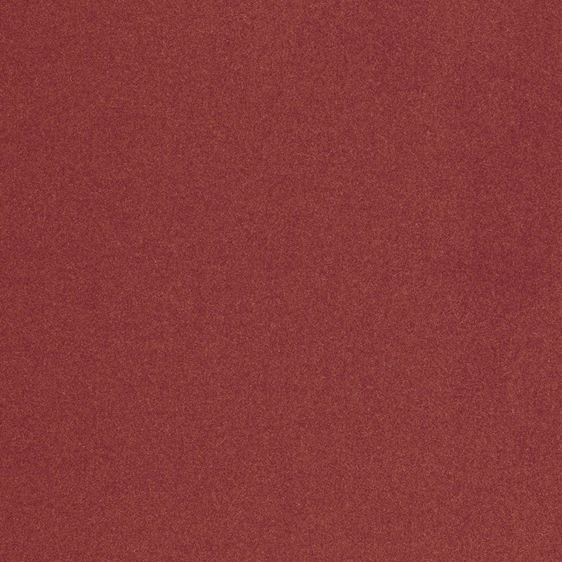 Rust red fabric swatch with subtle texture; warm, versatile material for upholstery or clothing.