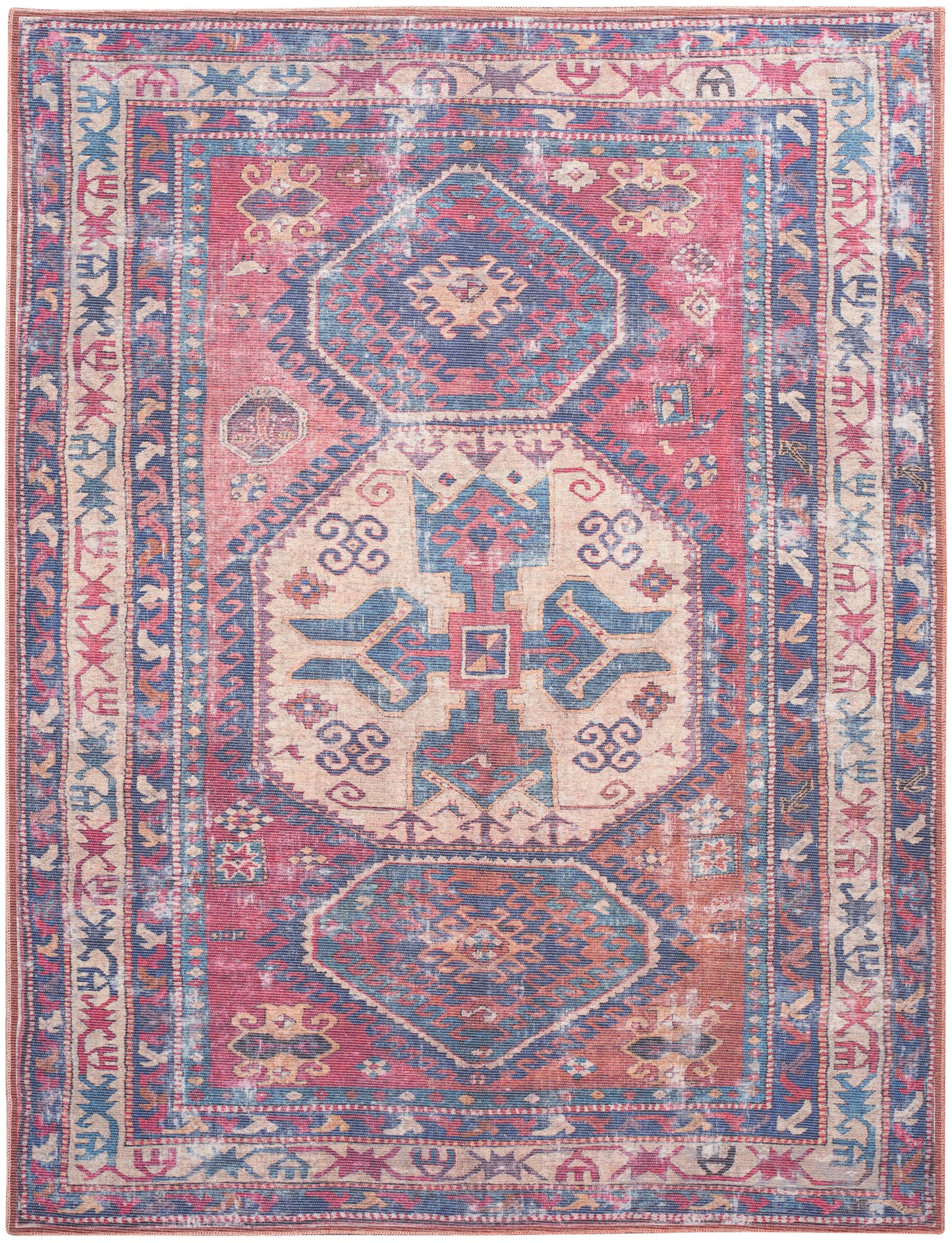 Colorful oriental rug with pink, blue and cream geometric medallions and an ornate border.