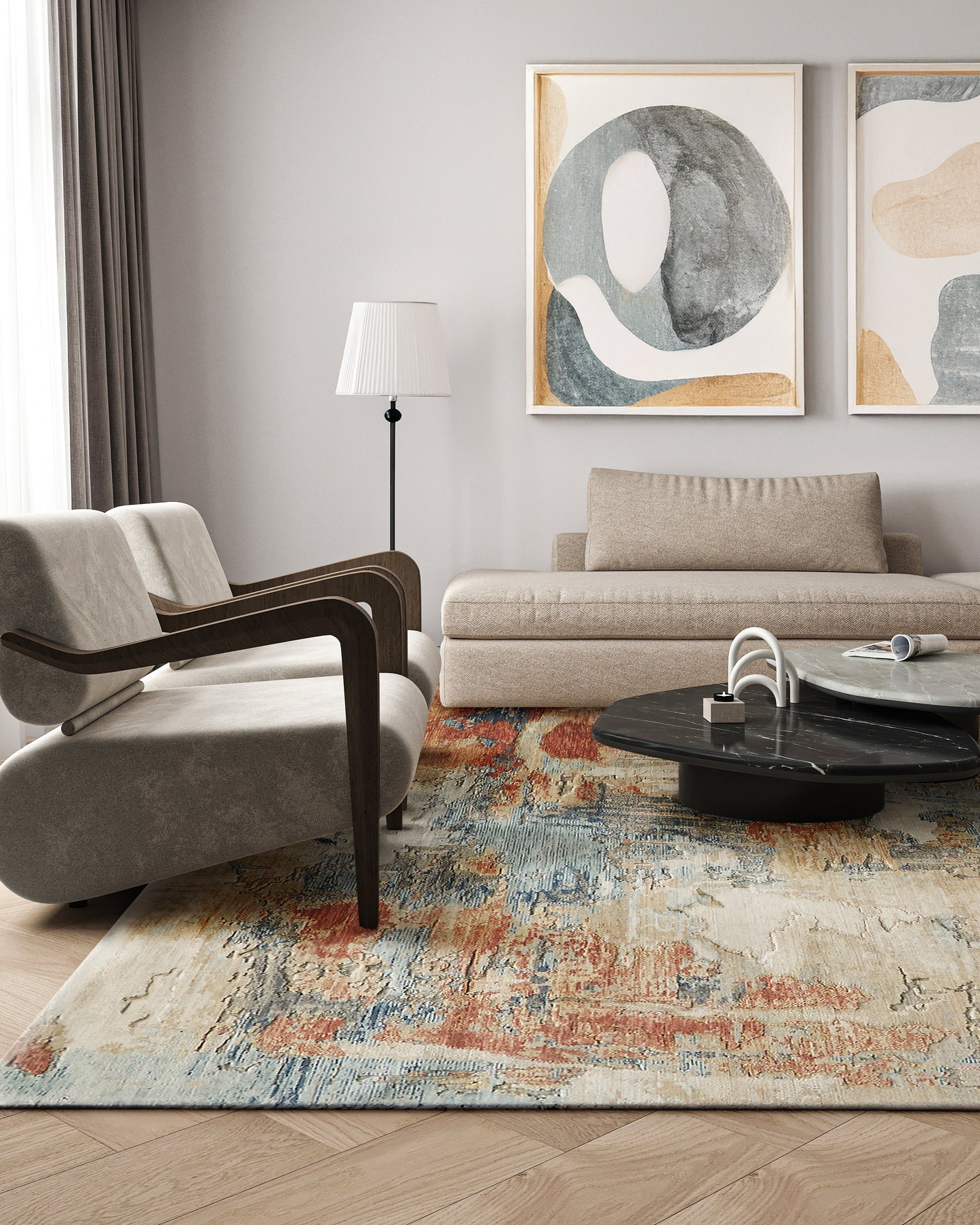 Modern beige living room with curved wood-armchair, sofa, abstract art, round black marble coffee table and colorful rug.