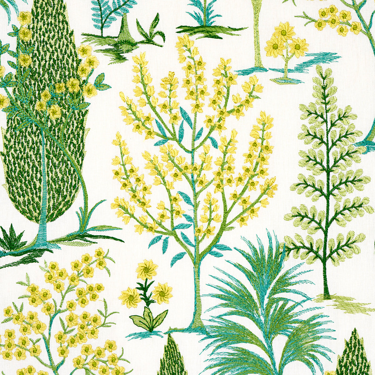 Embroidered fabric featuring yellow flowering shrubs, green trees and blue-green palm-like leaves on ivory background.