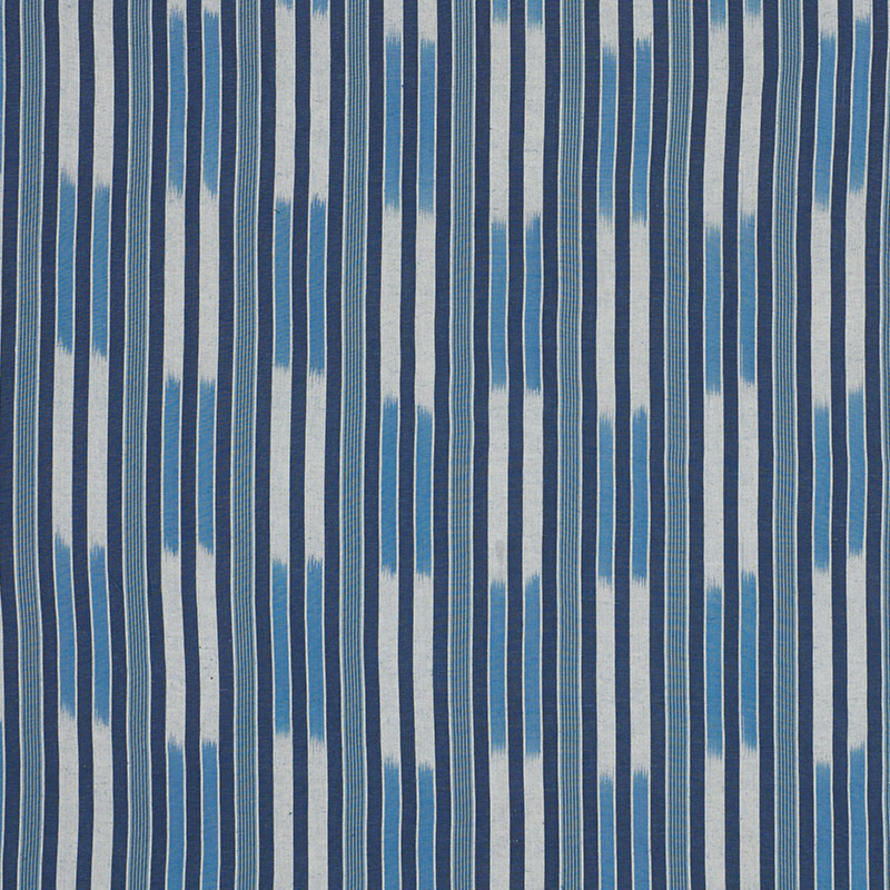Blue and white vertical striped fabric with navy and light-blue bands and softly blended edges.