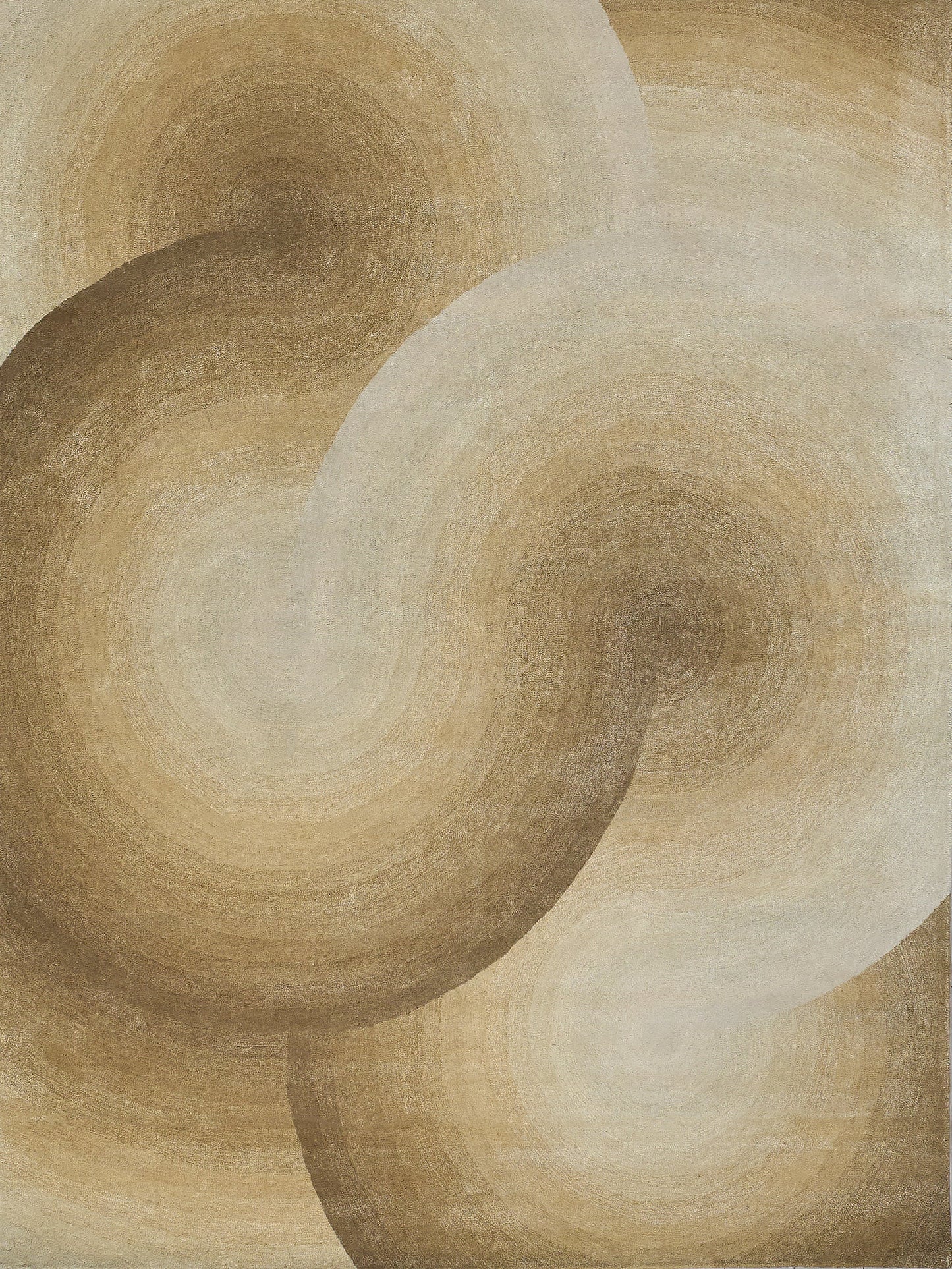 Abstract rug pattern with overlapping circular motifs in warm beige, taupe and brown tones.