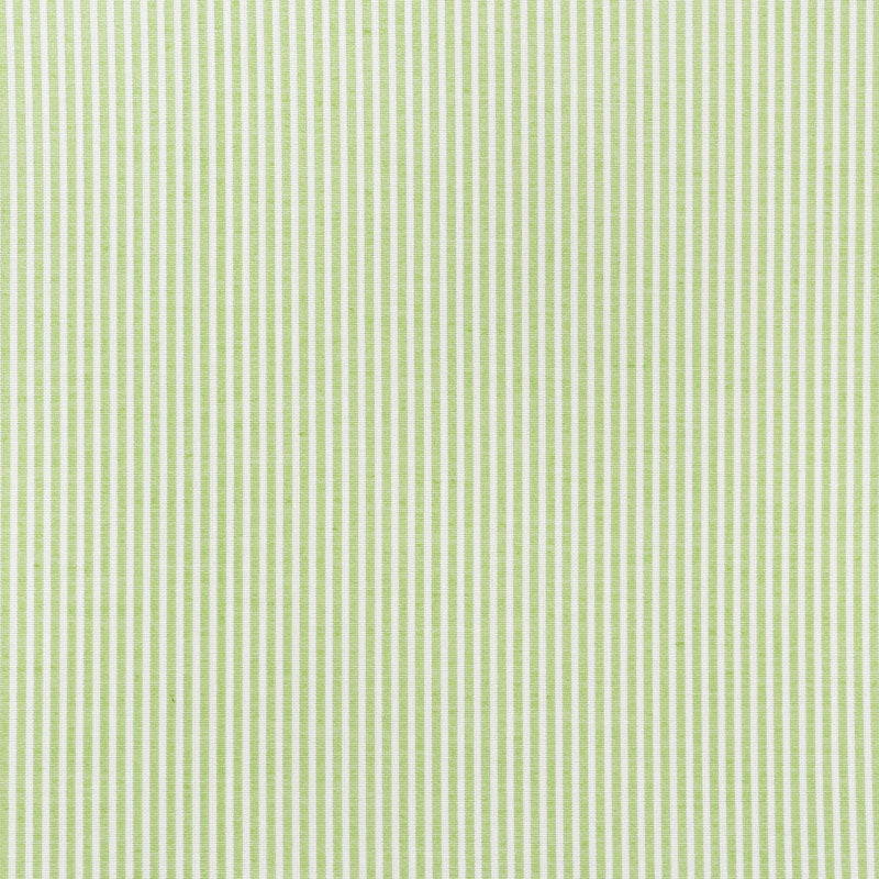 Light lime green and white vertical stripe fabric pattern.