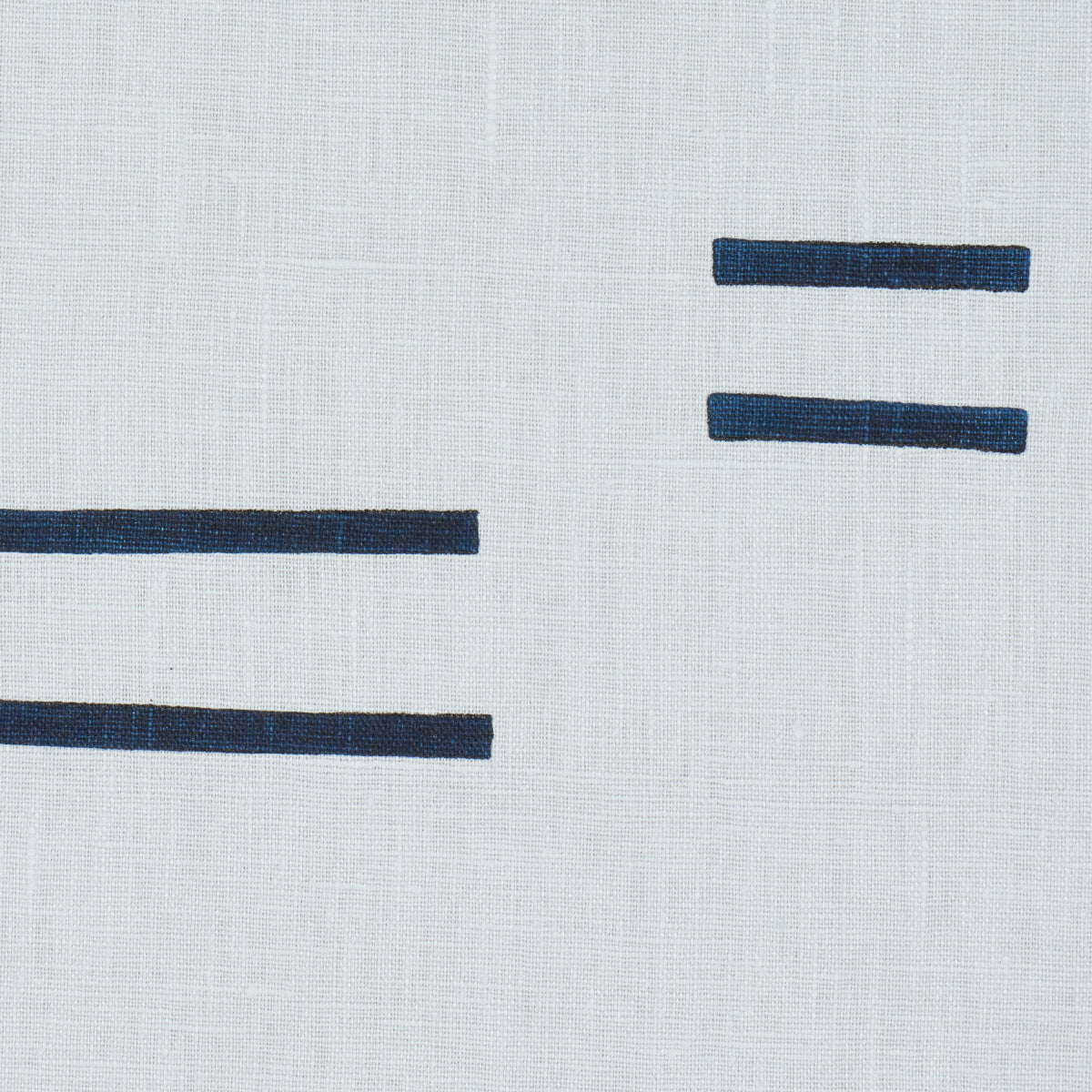 Minimalist navy brush-stroke lines on sky-blue background; abstract geometric textile print