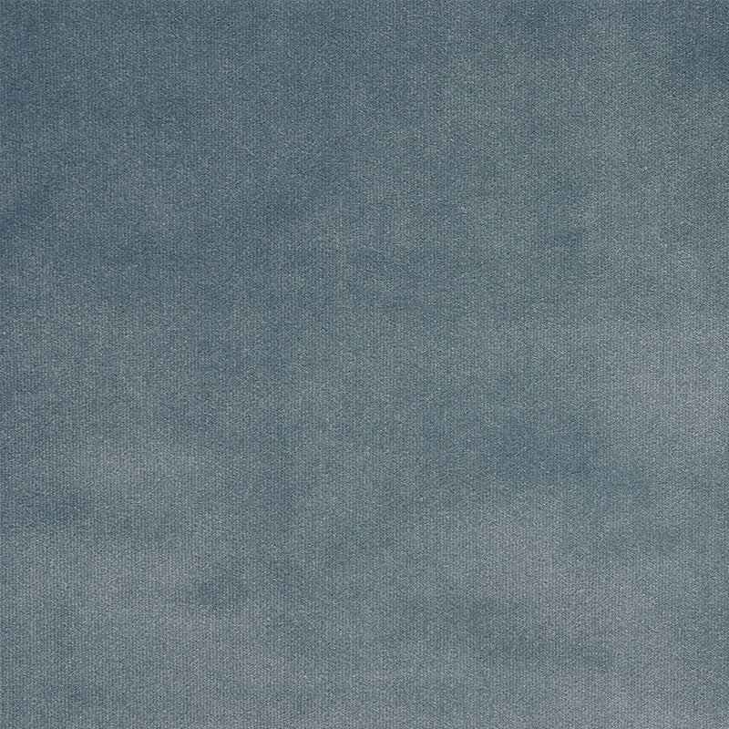 Blue textured fabric swatch with a denim-like weave and soft gradient shading.