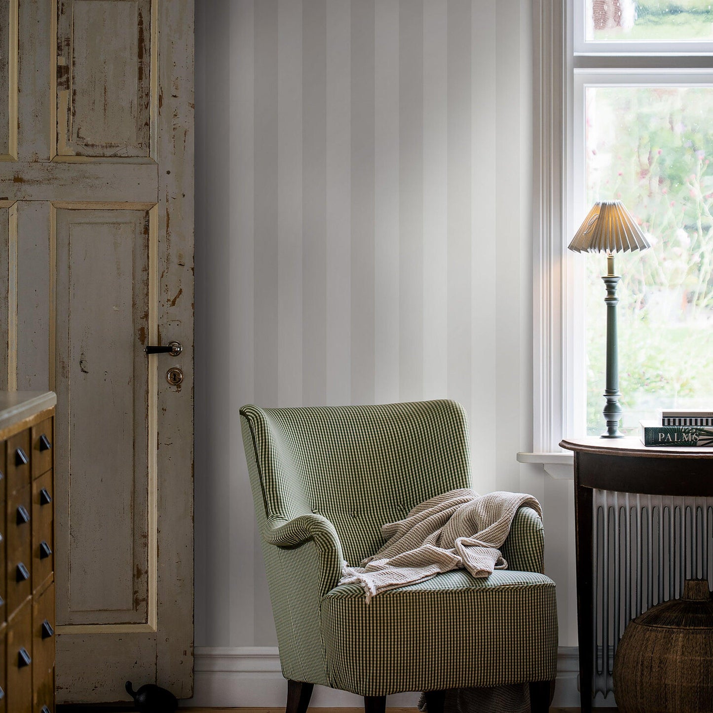 Bone-colored striped wallpaper.