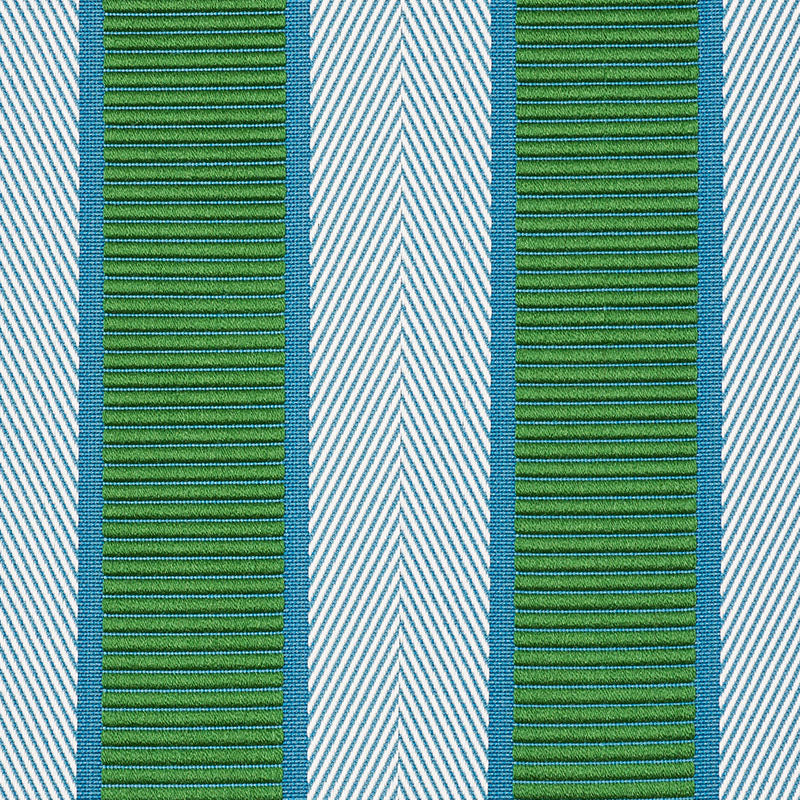 Close-up of green ribbed webbing with blue borders, vertical stripe pattern; strap for bag or belt.