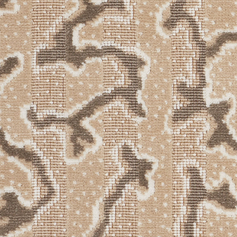 Beige and taupe rug with abstract serpentine pattern in a soft woven texture.