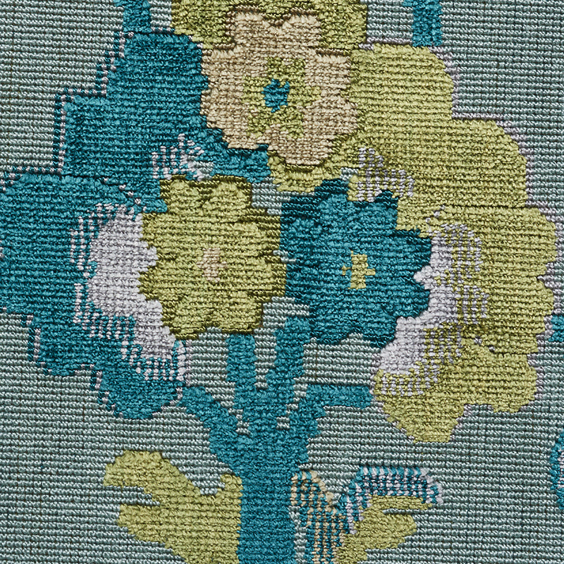 Teal, celadon and ivory floral velvet fabric with a textured pattern.