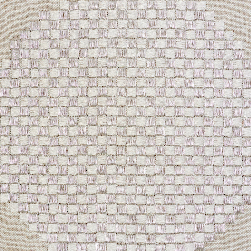 Circular beige woven placemat with ivory checkerboard squares; textured cotton/jute, ideal for table decor.