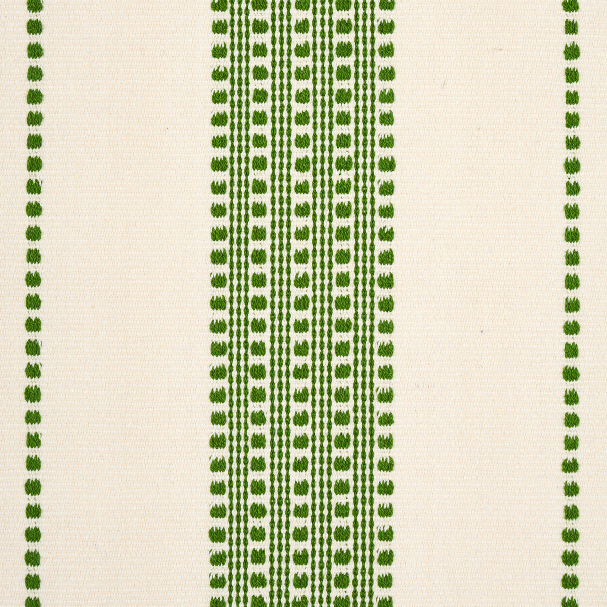 Cream woven fabric with narrow vertical rows of green dotted stripes; geometric textile for home decor.