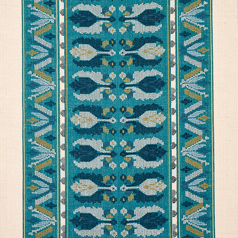 Teal woven rug runner with aqua leaf motifs, white and gold accents, and geometric borders.