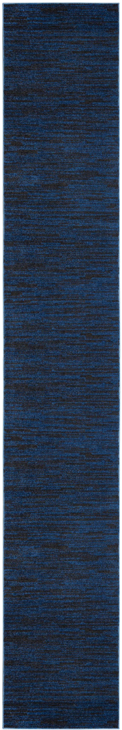 Blue marled runner rug with dark and medium blue tones and subtle textured surface