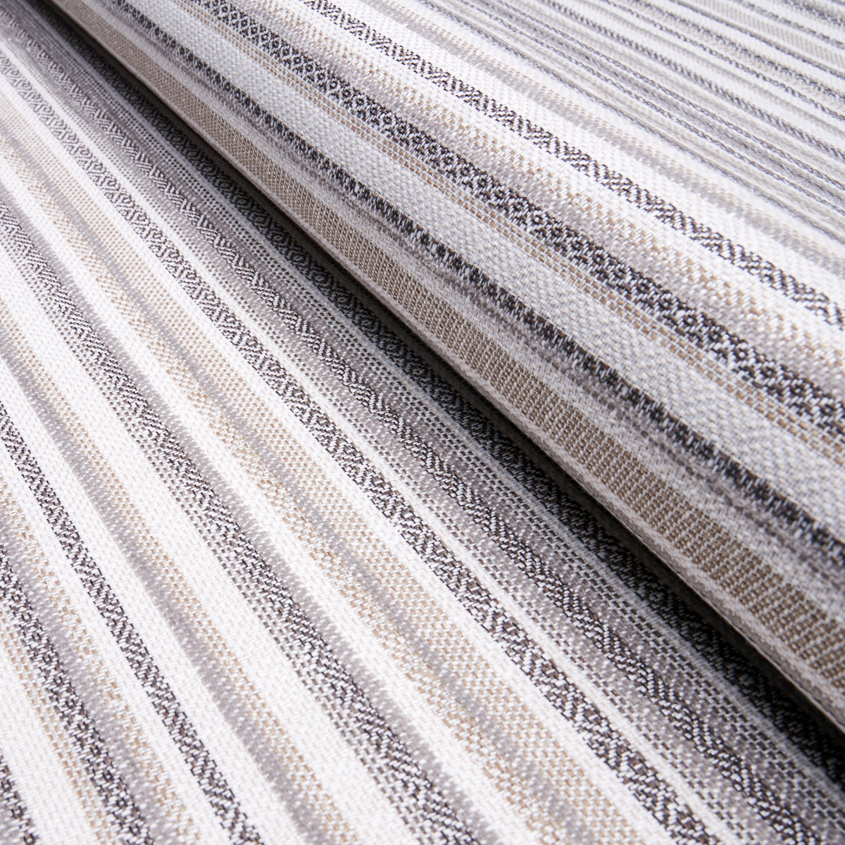 Beige and gray striped woven fabric with subtle geometric patterns, folded for display.