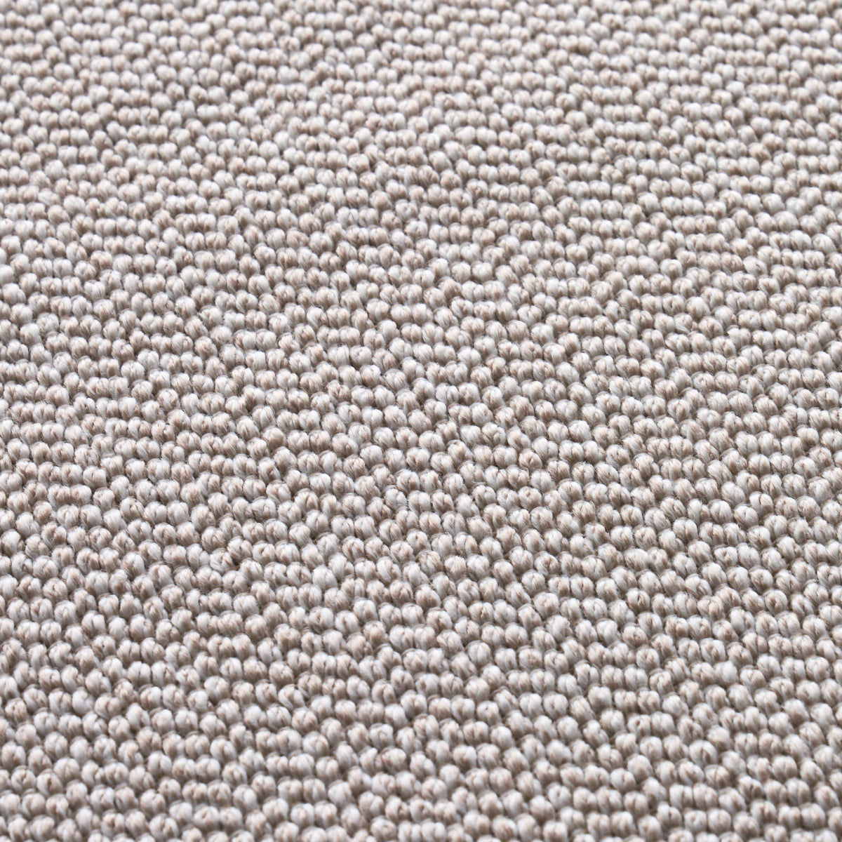 Beige loop-pile carpet close-up with tight, uniform textured fibers for neutral flooring.